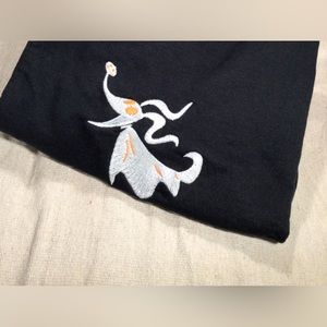 Embroidered Glow in the Dark, Zero, on Childs black Hanes EcoSmart crewneck.